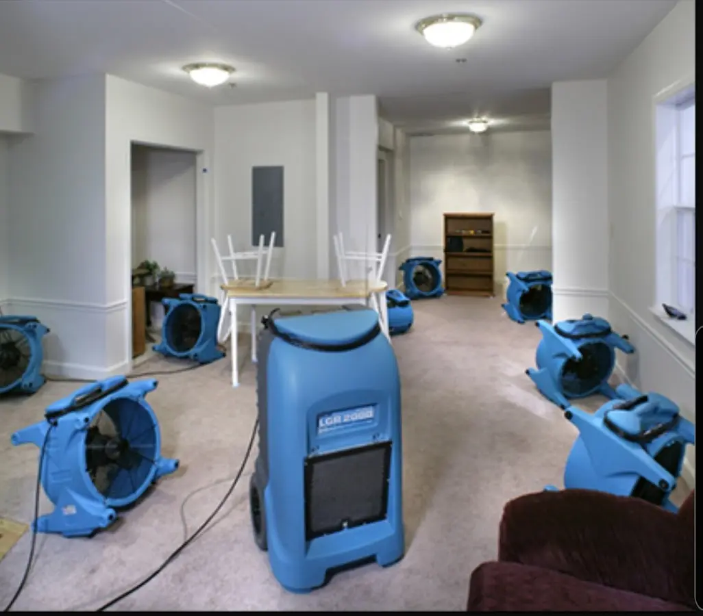 Air movers and dehumidifier setup for Water Damage Restoration in North Fond du Lac